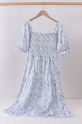 Navy smocked floral puff sleeve dress